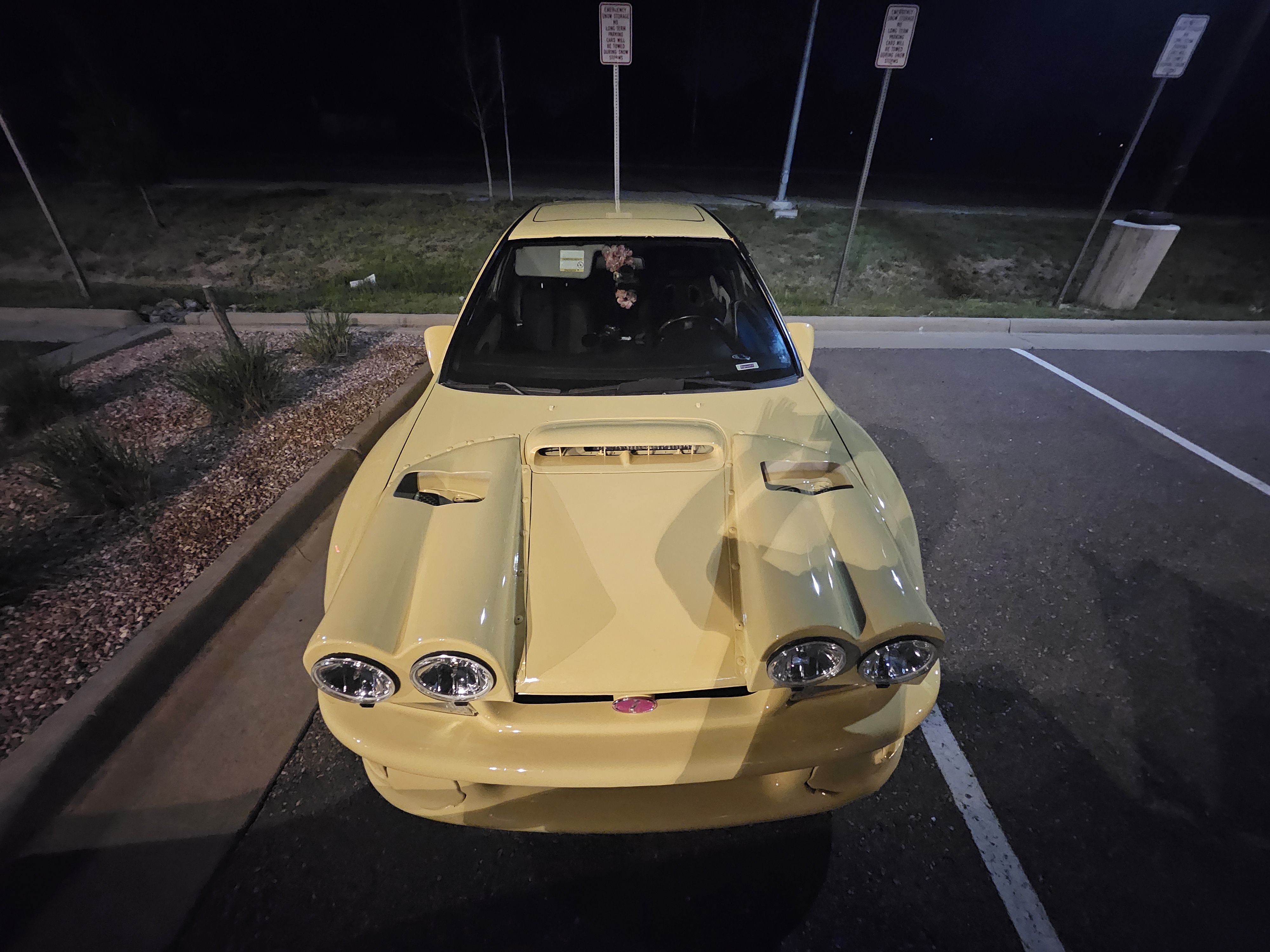 Front view of yellow car